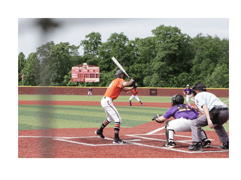 Batter at the plate, with catcher and umpire