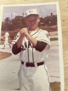 Young little leaguer with bat